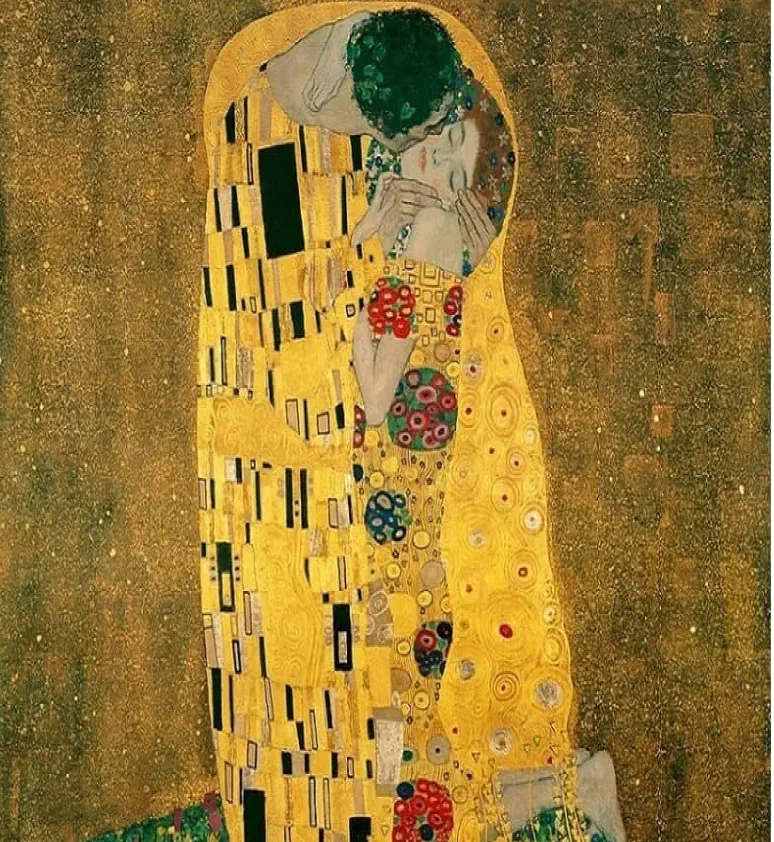 A man and woman embrace and kiss, wrapped in patterned golden robes, against a gold, textured background. The image is Gustav Klimt’s painting "The Kiss.