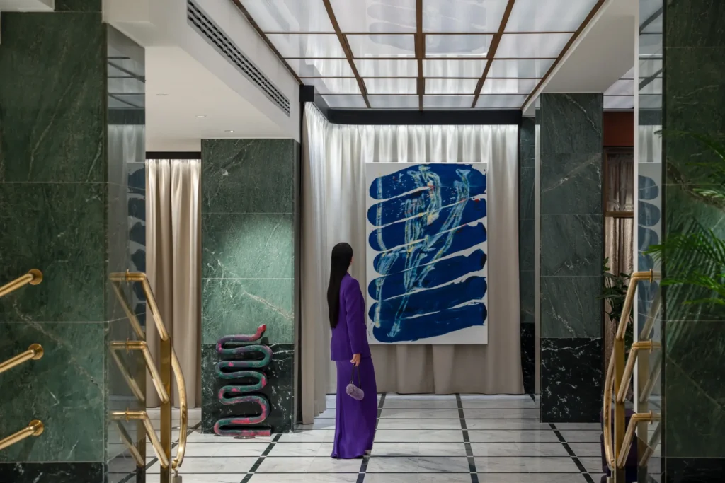 models exploring art in lobby 2